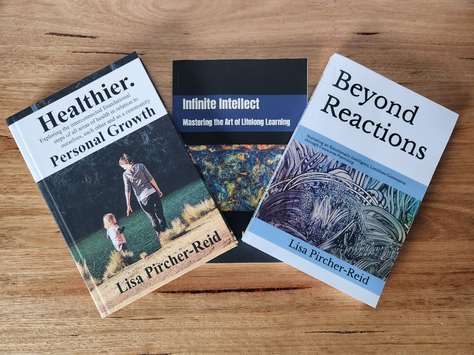 three books on a wooden table with a person leading a child by hand walking behind them on the cover of one book, liminal space, a stock photo, naturalism